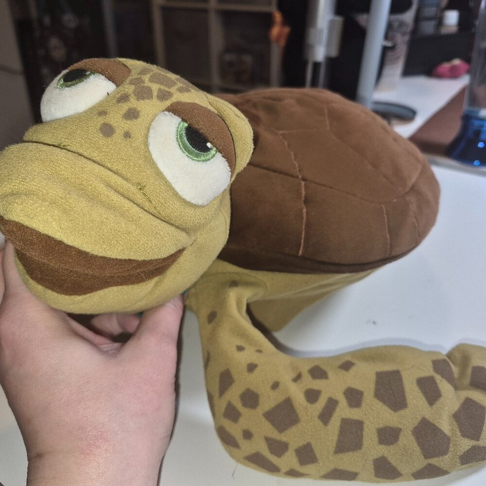 Finding Nemo "Crush" Sea Turtle plush toy and hand puppet.